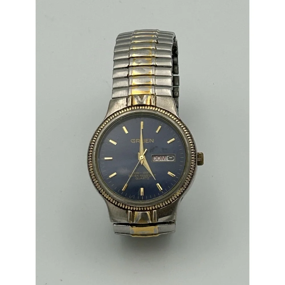 Gruen men's watch GU1022 Blue Face Stainless Steel And Gold Stretch Band Read